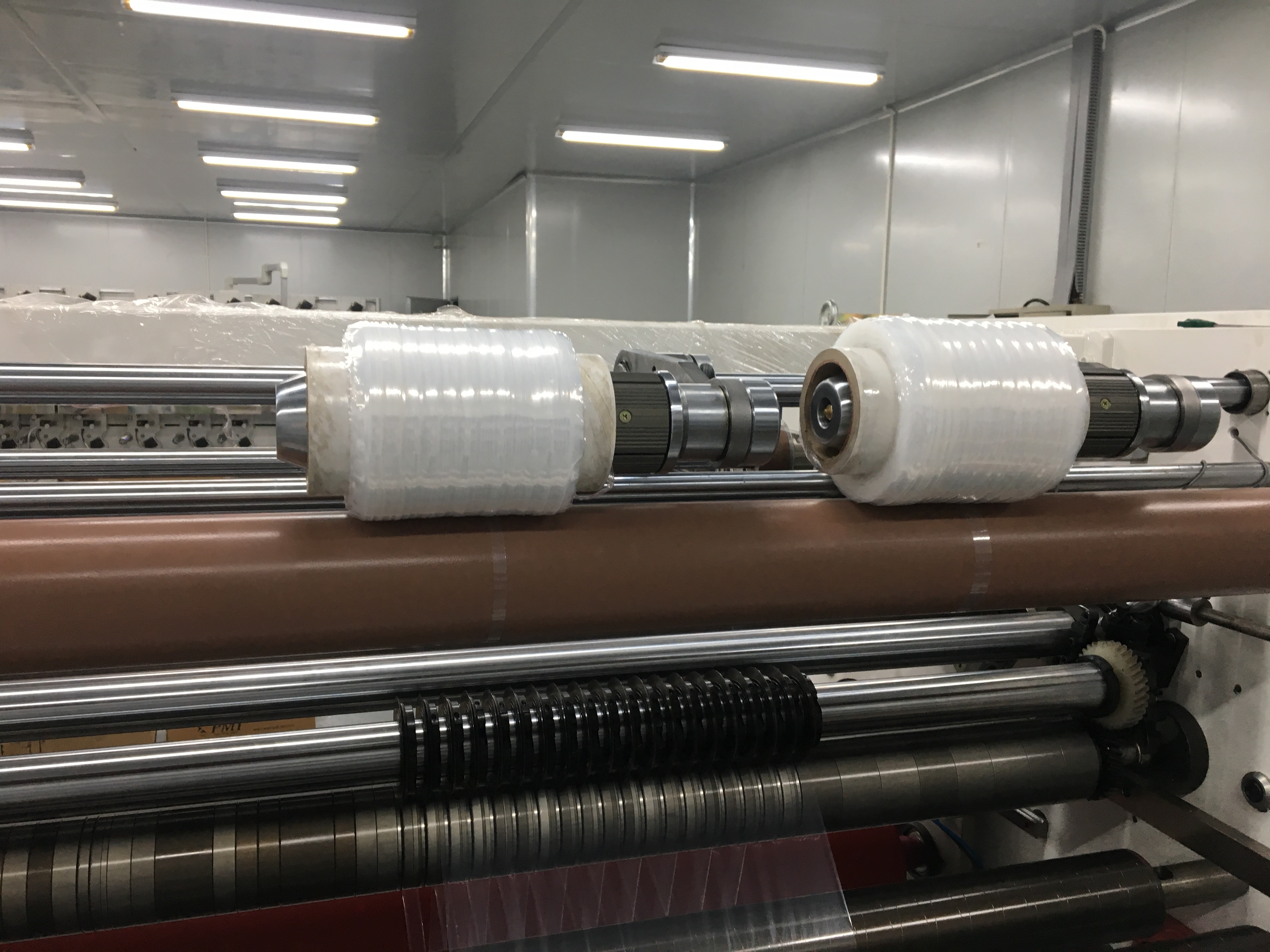 surface spool winder for edge trimming